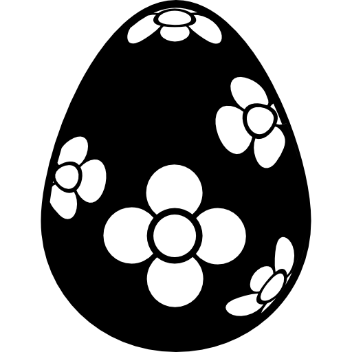 Easter egg of white chocolate with dark lines and dots decoration